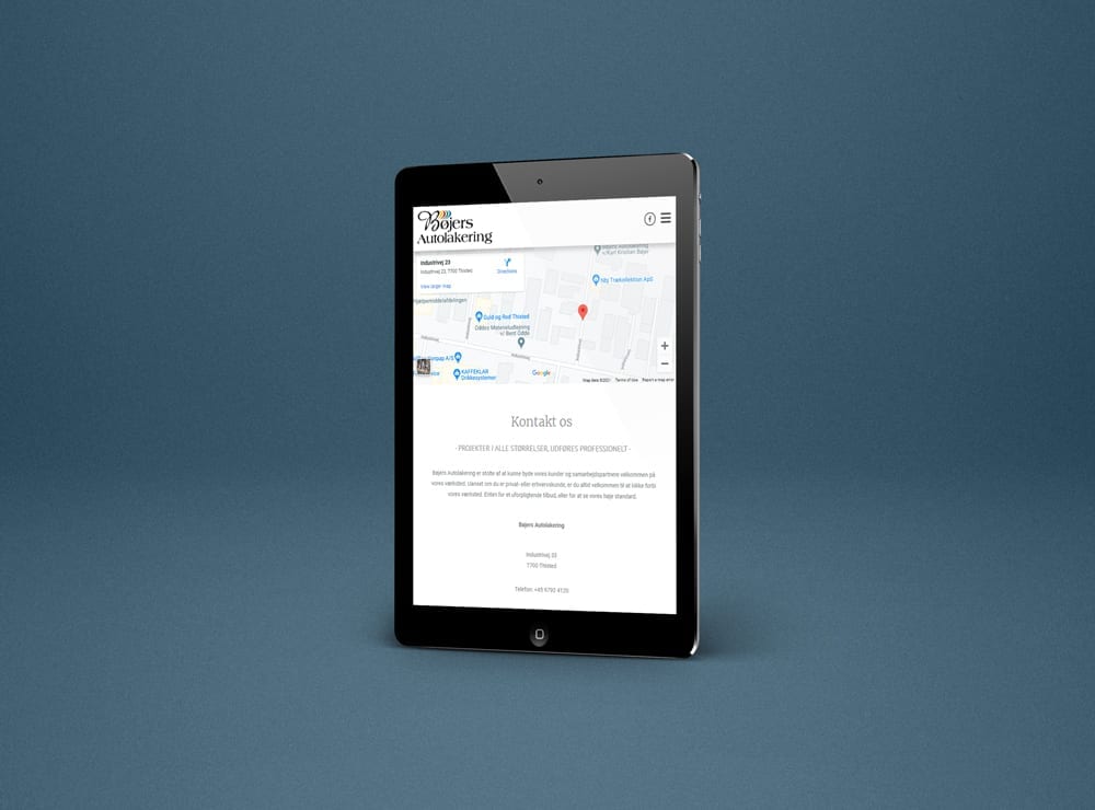 mockup af tablet med webdesign til Bøjers Autolakering
